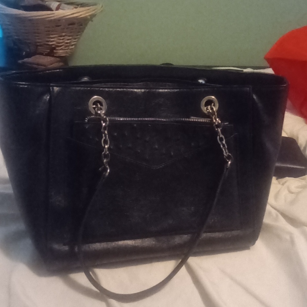 Black shoulder bag with removable pouch